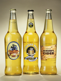 A variety of cider bottles from O-I, which produces over ...